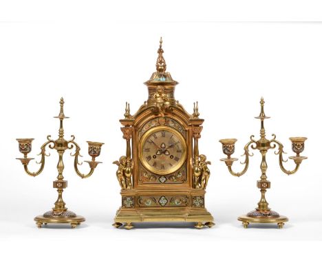 An Ormolu Champleve Enamel Striking Mantel Clock with Garniture, circa 1880, the elaborate case with champleve enamel multi-c