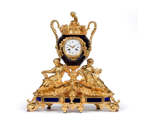 An Ormolu and Sevres Style Striking Mantel Clock, retailed by Levy Freres A Paris, circa 1880, urn shaped dark blue porcelain