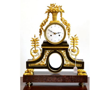 An Ormolu and Marble Striking Mantel Clock, a Paris, 19th century, surmounted by a vase of flowers, floral pieced borders, re