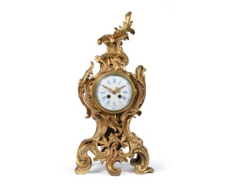 A Gilt Bronze Striking Mantel Clock, circa 1890, scroll decorated case, 5-inch enamel dial with Roman and Arabic numerals, tw