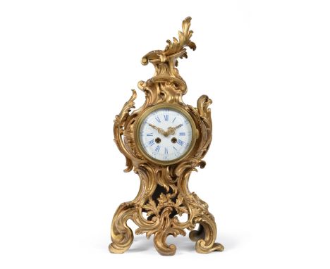 A Gilt Bronze Striking Mantel Clock, circa 1890, scroll decorated case, 5-inch enamel dial with Roman and Arabic numerals, tw