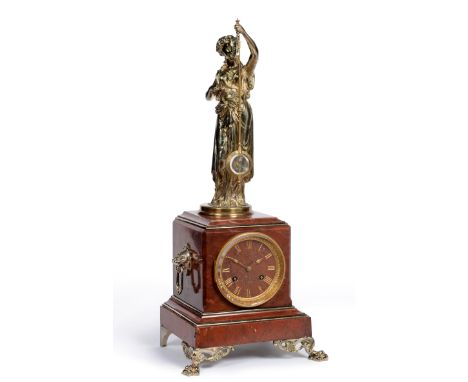 A Good Red Marble Striking Mystery Clock, signed A R Guilmet, circa 1870, surmounted by a gilt metal classical lady in robes 