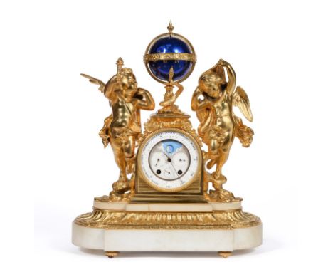 An Unusual Ormolu and White Marble Calendar Moonphase Striking Mantel Clock with a Revolving Dial, circa 1860, surmounted wit