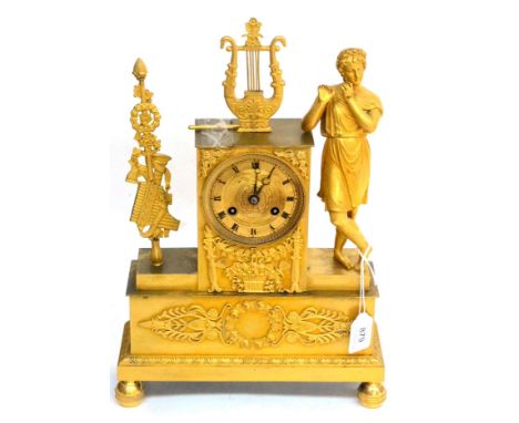 An Ormolu Striking Mantel Clock, circa 1840, the musical themed case flanked by a gentleman in robes playing a flute, lyre an