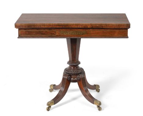 A Fine Regency Rosewood and Brass Inlaid Card Table, early 19th century, the hinged leaf enclosing a green baize lined interi