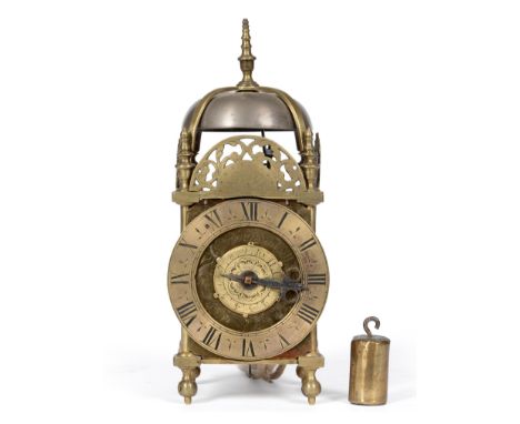 A Small Brass Lantern Timepiece with Alarm, signed Edward Rundell, circa 1730, turned finials and pierced frets, side opening