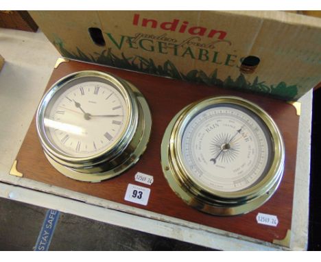 A mounted ships clock/ barometer