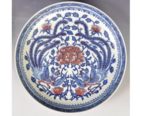 A 20th Century Chinese Republic period Kangxi mark (1662-1722) Oriental porcelain charger plate bowl of circular form having 