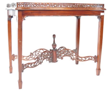 A 20th Century Chinese Chippendale Revival mahogany silver table in the 18th Century Georgian George II manner having an intr