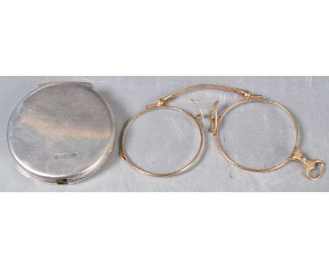 A pair of antique early 20th Century English gold&nbsp;lorgnette /&nbsp;spectacle glasses having a folding sprung&nbsp; mecha