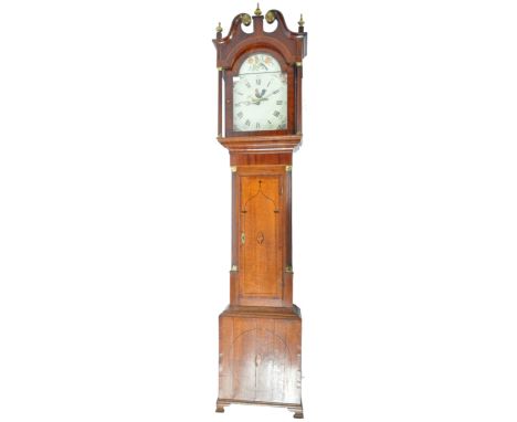 An antique early 19th Century Georgian oak and mahogany longcase clock grandfather clock. Brass set arched pediment top with 