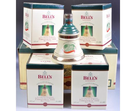 An impressive set of four Arthur Bell &amp; Sons&nbsp; Bells / Bell's Finest Scotch Whisky Christmas Decanter 1998 porcelain 