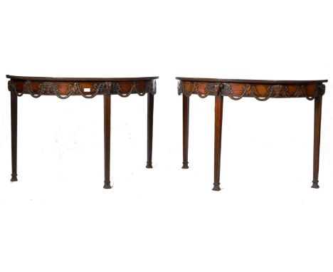 An impressive pair of early 20th Century Edwardian mahogany side tables / console tables in the manner of Robert Adam. The ta