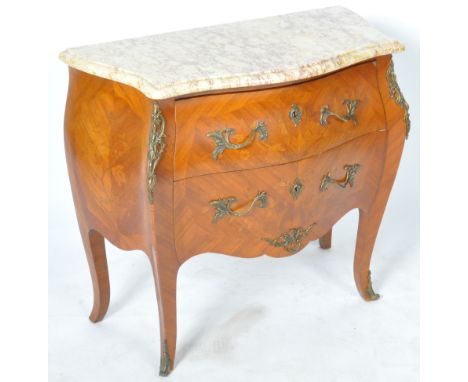 An antique early 20th Century French marquetry&nbsp;marble topped bow fronted commode / chest of drawers. Shaped chamfered ed