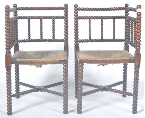 A pair of antique 19th Century Victorian Arts &amp; Crafts movement bobbin turned corner chairs in the manner of William &amp