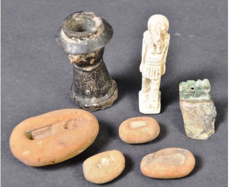 Egyptian Artifacts - A collection of 7x Ancient Egyptian artifacts to include three small terracotta amulet moulds, a larger 