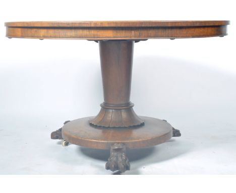 An antique 19th Century William IV rosewood loo lanterloo tilt top breakfast dining table having a circular tilt top with goo