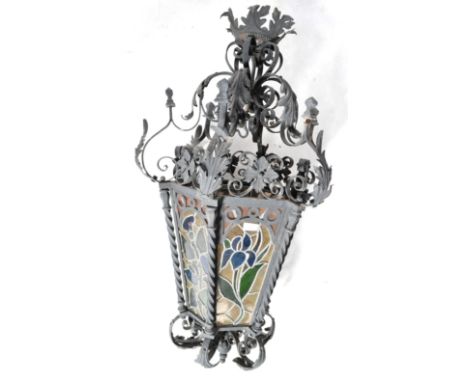 A large and impressive antique 19th Century French / Italian toleware lantern light having multiple stained lead glass panels