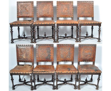 Gregory &amp; Co - A set of eight late 19th / early 20th Century embossed leather and studded dining chairs / side chairs in 