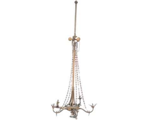 A large and impressive antique 19th Century architectural brass chandelier electrolier having a brass sugar twist cane column