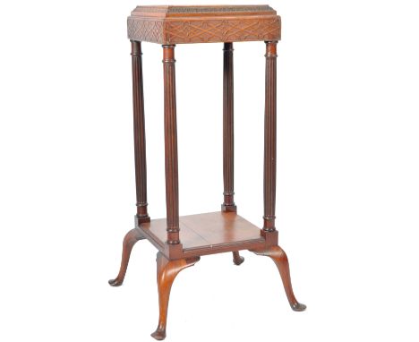 An antique 19th Century Victorian mahogany bust stand / jardiniere plant planter stand having an inset and raised square top 