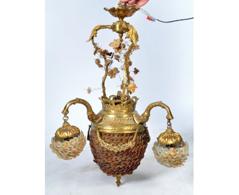 A large mid 20th Century Italian antique style hanging chandelier of brass and glass construction. Decorative scroll and flor