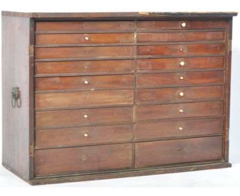 An antique 19th Century Georgian Regency period flame mahogany specimen cabinet / collectors cabinet comprising of two banks 