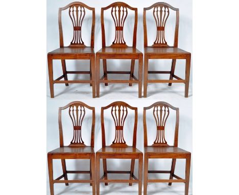 A set of six antique 18th Century Chippendale influence oak and elm country house dining chairs / side chairs having good gra