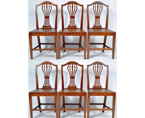 A set of six antique 18th Century Chippendale influence oak and elm country house dining chairs / side chairs having good gra