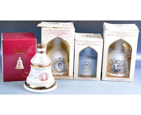 A collection of four Arthur Bell &amp; Sons Bells / Bell's Finest Scotch Whisky Commemorative Decanter porcelain decanters wi