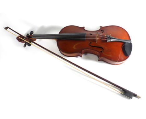 A late 19th/early 20th century cased Herman Dolling junior violin and bow   CONDITION REPORT:  Length of back (include button