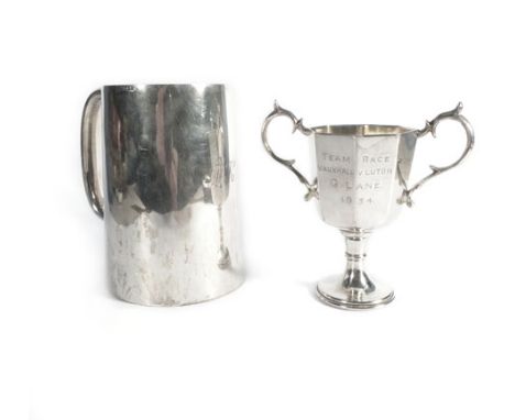 A silver tankard of plain tapered cylindrical form, maker HA, Sheffield 1942, h. 12.5 cm, 11.5 ozs, together with a miniature