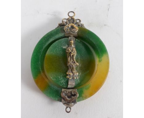 A Chinese jade and metalware mounted amulet pendant of circular form having a central swivel section, l. 7 cm   CONDITION REP