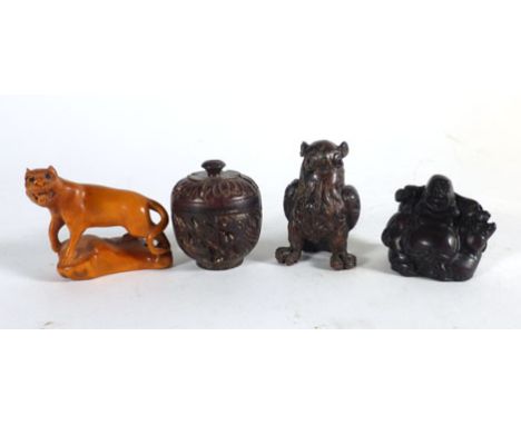A modern carved wood netsuke in the form of a tiger, h. 4.5 cm and three further netsukes and objects (4)   CONDITION REPORT:
