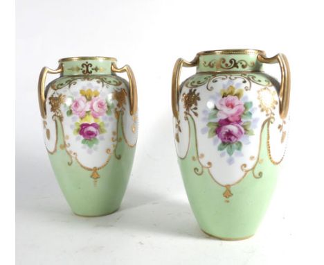 A pair of Noritake vases of ovoid form, each having three gilt decorated handles above a pale green body decorated with flowe