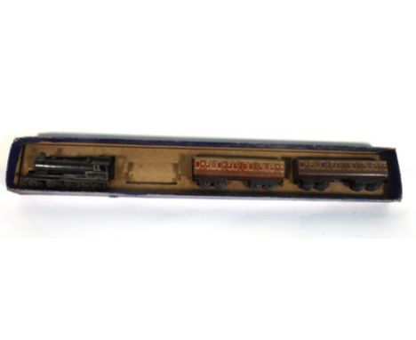 A Bing miniature tin plate train set consisting engine and two coaches, boxed   CONDITION REPORT:  Incomplete and with losses