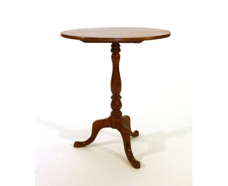 A group of three 19th century and later mahogany tripod wine tables