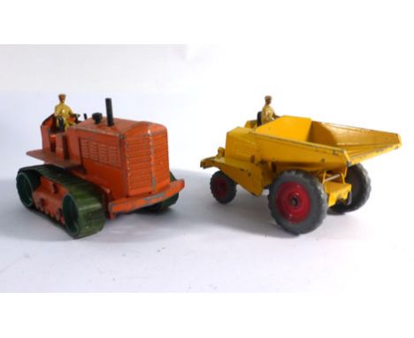 Three Dinky Supertoys commercial models consisting:561 Blaw Knox bulldozer,562 dumper truck and563 heavy tractor, each boxed 