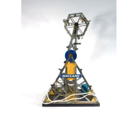 A 1950's Meccano shop display model in the form of a fairground double ferris wheel,h. 76 cm,w. 48 cm   CONDITION REPORT:  Co