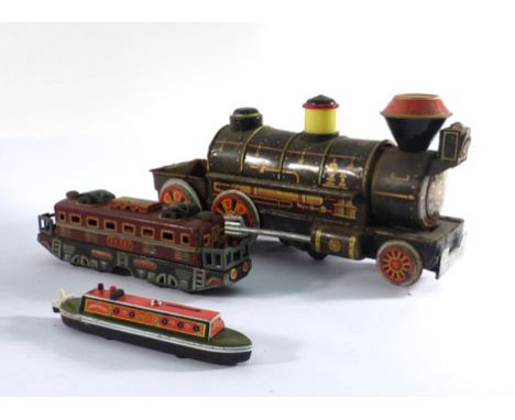 A large scale battery operated tinplate train and four Japanese tinplate coaches, partial boxes   CONDITION REPORT:  Conditio