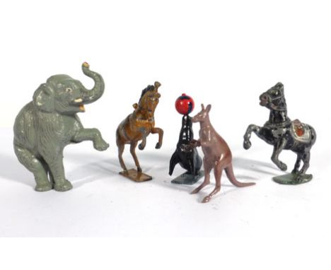 A mixed group of Charbens and other lead and cast metal circus animals including prancing horses, boxing kangaroo, balancing 