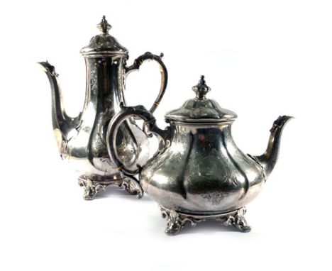 A Victorian silver teapot of squat pumpkin shaped form and having engraved decoration on outswept foliate feet, Edward, Edwar