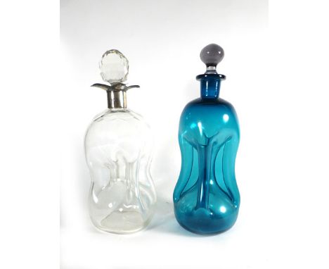 A silver mounted clear glass 'glug glug' decanter, h. 28 cm, together with a kingfisher blue decanter and another clear decan