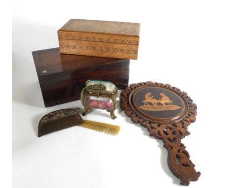 A group of boxes and collectables including a box in the form of a book binding, a desk blotter, a treen marquetry hand mirro