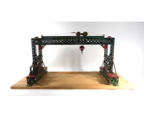 A 1950's Meccano shop display model in the form of an overhead crane,h. 38 cm,w. 66 cm   CONDITION REPORT:  Completeness and 