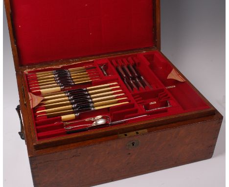 A mid-Victorian oak fitted cutlery canteen and part contents, in the Kings pattern, comprising; twelve tablespoons, twelve de