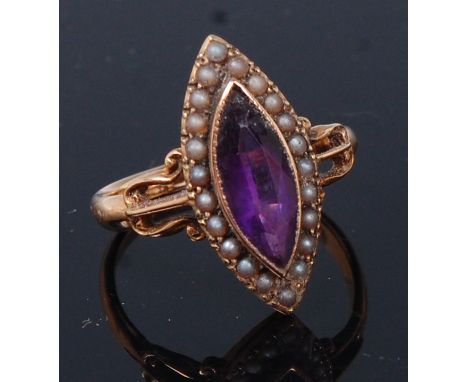 A late Victorian 15ct gold, amethyst and pearl marquise ring, the marquise cut amethyst weighing 1.4ct (with fracture loss to