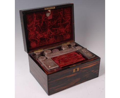 A Victorian coromandel fitted toilet box by C Asprey of 166 Bond Street, the hinged cover opening to reveal concealed mirror 