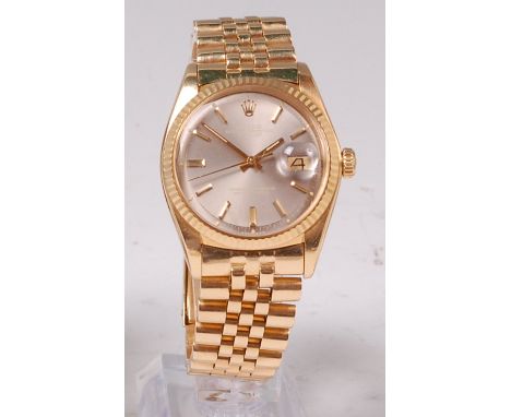 A gents 18ct gold Rolex Oyster Perpetual Datejust wristwatch, the signed silvered dial with baton markers, further annotated 