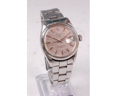 A gents vintage Rolex steel cased Oyster Perpetual Date wristwatch, having signed silvered dial and further marked Superlativ